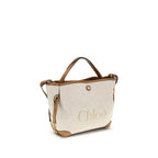 Chloé Clover Logo Canvas Handbag in Beige