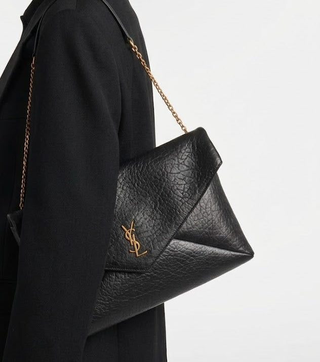 Saint Laurent Cassandre envelope leather clutch with YSL logo on shoulder